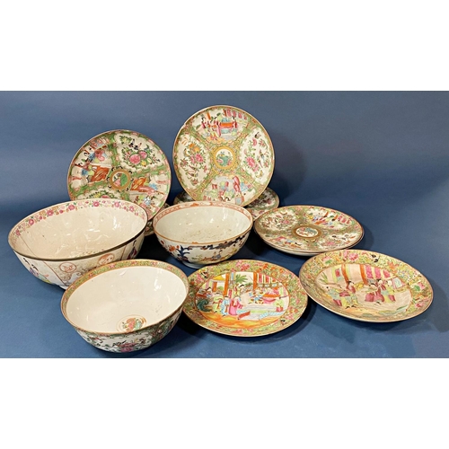 57 - Group of 19th Century Chinese Canton famille rose porcelain bowls and dishes to include: punch bowl ... 