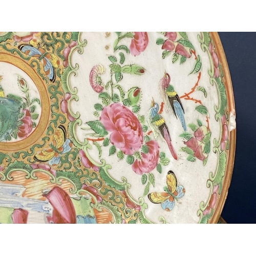 57 - Group of 19th Century Chinese Canton famille rose porcelain bowls and dishes to include: punch bowl ... 