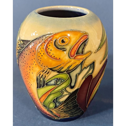 81 - A Moorcroft oviform vase showing leaping trout, 10 cm