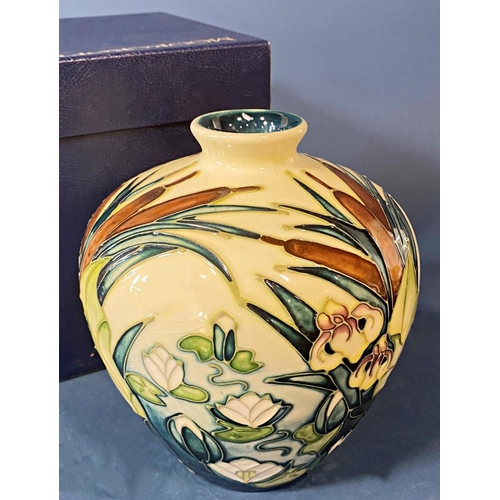 84 - An Moorcroft oviform vase with bulrush and water lily design together with box, 19 cm tall