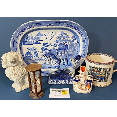 95 - A large willow pattern platter, a Delft vase and cover, 19th century twin handled mug with transfer ... 