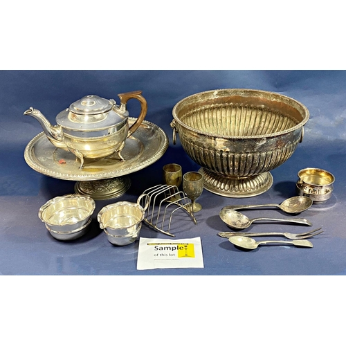 174 - A large quantity of silver plated table ware, including a large oval tray, toast rack, vinaigrette s... 