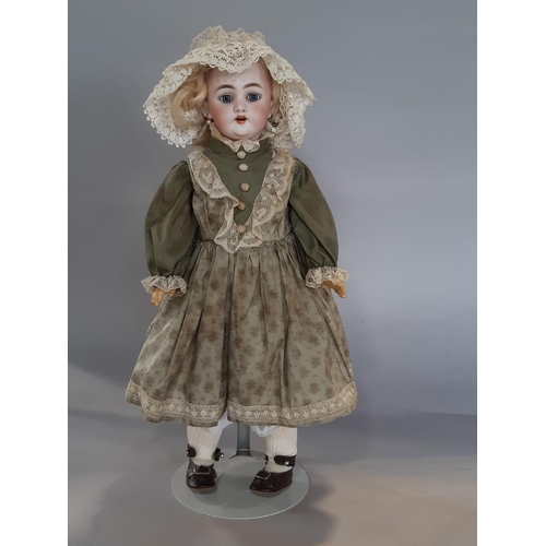 597 - Collection of antique and reproduction dolls and accessories including a large bisque head character... 