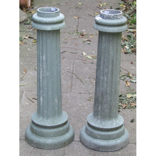 1086 - A pair of light green painted cast alloy cylindrical fluted columns/pedestals 70 cm high