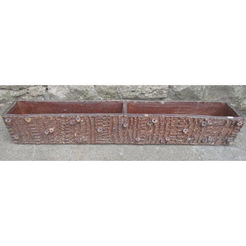 1100 - A salt glazed two divisional rectangular flower trough with rustic/naturalistic bark finish/surround... 