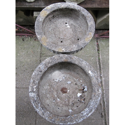 1105 - A pair of painted and weathered cast composition stone garden planters with circular fluted bowls ra... 