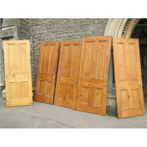 1113 - Five reclaimed stripped pine quarter panelled internal doors, (varying size)