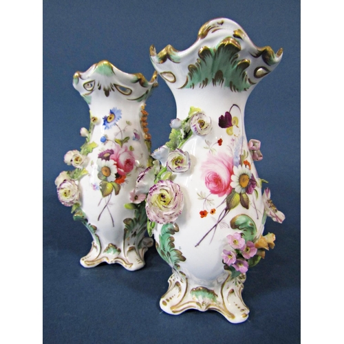 131a - Collection of floral encrusted ceramics comprising a pair of Coalbrookdale porcelain vases with gilt... 