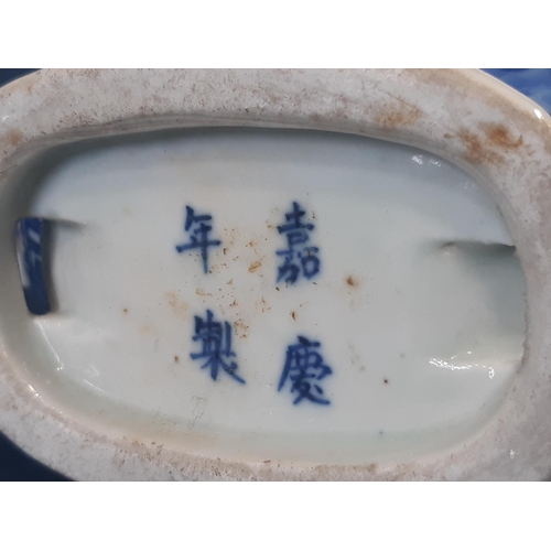 59 - Two pieces of Chinese blue and white porcelain to include: a pilgrim flask with calligraphy on both ... 