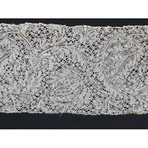 457 - A length of 17th/18th century Valenciennes or Binche bobbin lace; there are 3 joins in the length, w... 