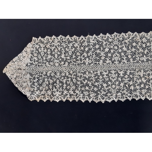 458 - 4.7m length of Venetian Rose Point needle lace. with part of the length joined along the straight ed... 