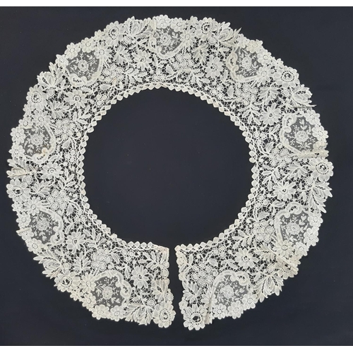 461 - 19th century lace bertha finely worked in a floral design with point de gaze type sections. Depth of... 