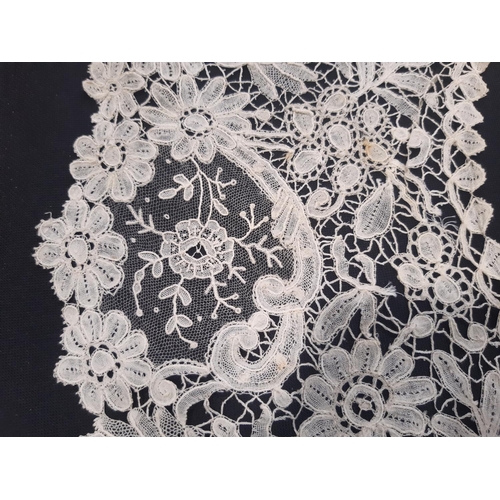 461 - 19th century lace bertha finely worked in a floral design with point de gaze type sections. Depth of... 