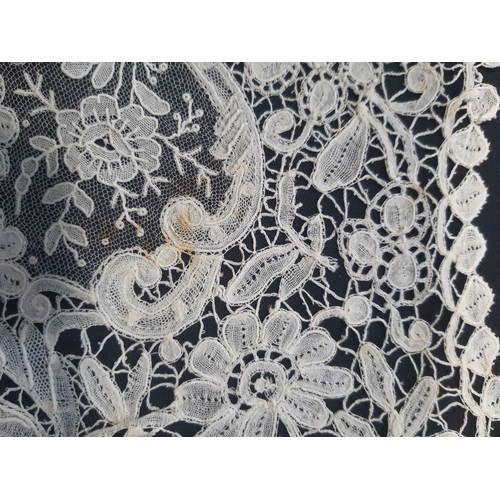 461 - 19th century lace bertha finely worked in a floral design with point de gaze type sections. Depth of... 