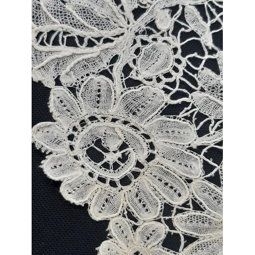 461 - 19th century lace bertha finely worked in a floral design with point de gaze type sections. Depth of... 