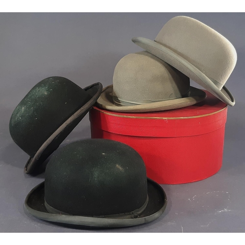 445 - Four bowler hats including 2 black and a grey by Christy's, together with a red hat box (5)