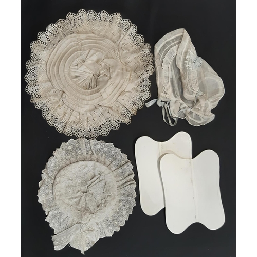 463 - Two Victorian white cotton hats elaborately sculpted with broderie anglais together with a starched ... 