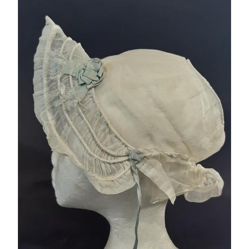 463 - Two Victorian white cotton hats elaborately sculpted with broderie anglais together with a starched ... 