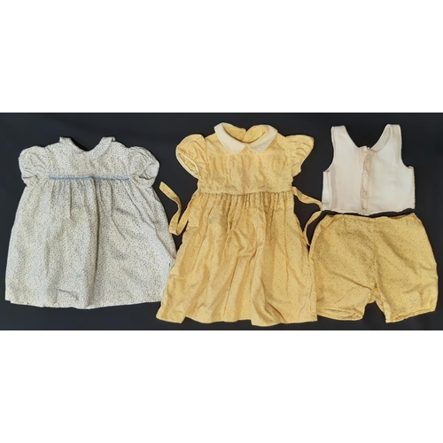 464 - Vintage childrens clothing; a Liberty bodice (size- age 2), 2 dresses (one Viyella), all with WW2 Ut... 