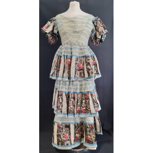 432 - An unusual hand stitched dress late 19th/ early 20th century, in an Italian/ Spanish style with stri... 