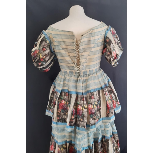 432 - An unusual hand stitched dress late 19th/ early 20th century, in an Italian/ Spanish style with stri... 