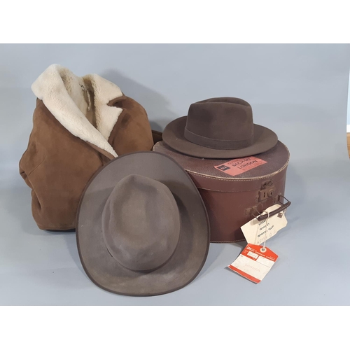 453 - Mens hats by Akubra (Australian) and Joule & Son together with a vintage sheepskin coat and hat box ... 