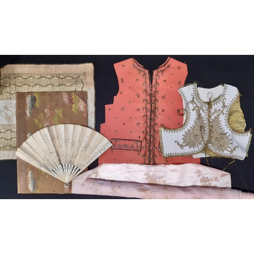 446 - Interesting collection of textiles including an antique waistcoat (front panel only) in coral silk t... 