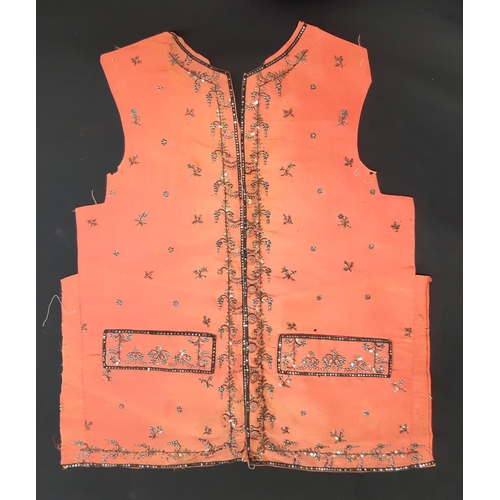 446 - Interesting collection of textiles including an antique waistcoat (front panel only) in coral silk t... 