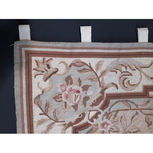 438 - Needlepoint wall hanging 1.8x1.16m in floral classical style in muted shades, together with a needle... 