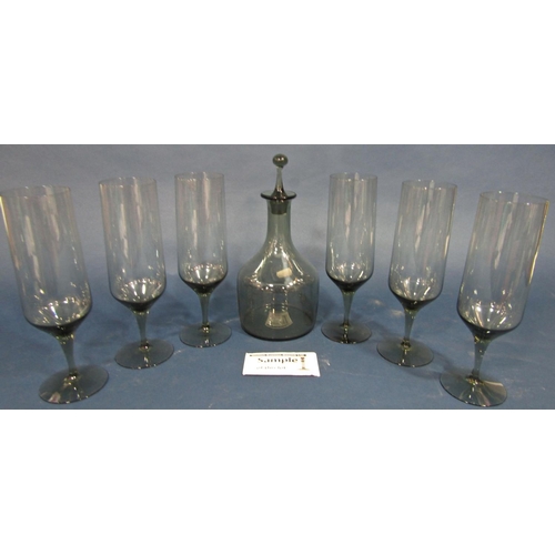 106 - Holmegaard style smoky glassware, including six tall wine glasses, six smaller aperitif glasses, fou... 