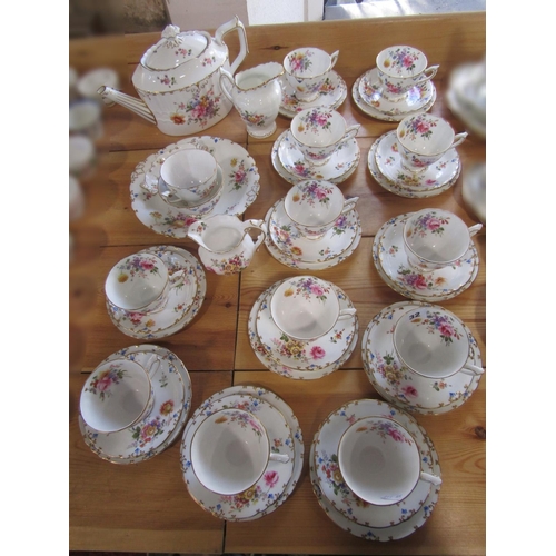 32 - A collection of Royal Crown Derby tea wares comprising teapot, sugar bowl, milk jug, cream jug, cake... 