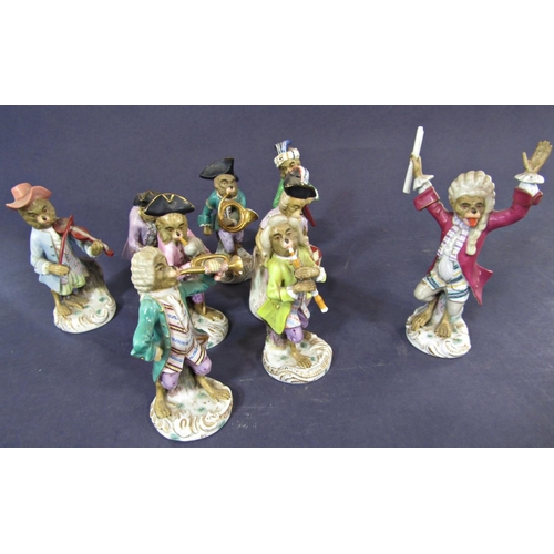 36 - Nine German 19th century Dresden porcelain monkey band figures, 14 cm high