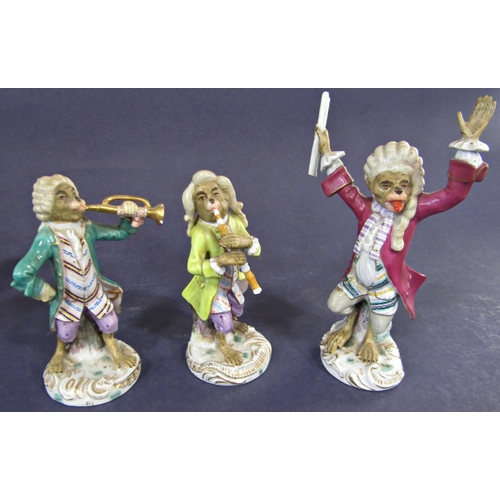 36 - Nine German 19th century Dresden porcelain monkey band figures, 14 cm high