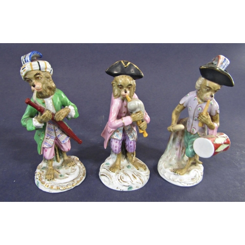 36 - Nine German 19th century Dresden porcelain monkey band figures, 14 cm high