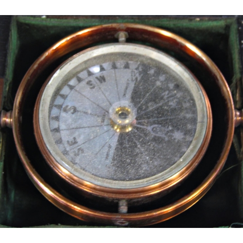 385 - A 19th century travelling compass with a gimbled framework, maker J Browning of London, set within a... 