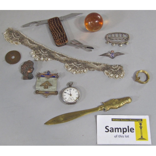 389 - A miscellaneous collection including a few military buttons, coins, pocket knife, etc