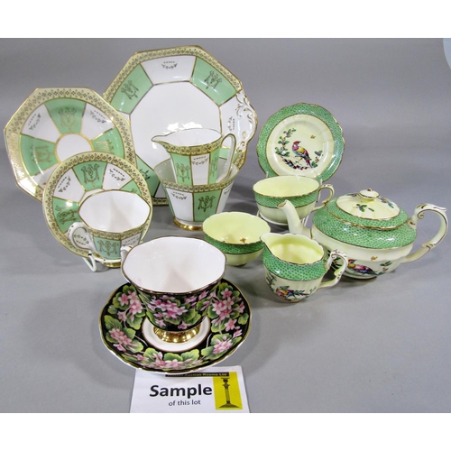 83 - A Crown Staffordshire tea for two service with bird and green scale detail, a further Royal Stafford... 