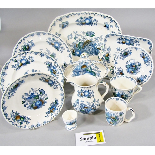 93 - A collection of Masons Fruit Basket patterned dinner and tea wares, plates, tureens, cups and saucer... 