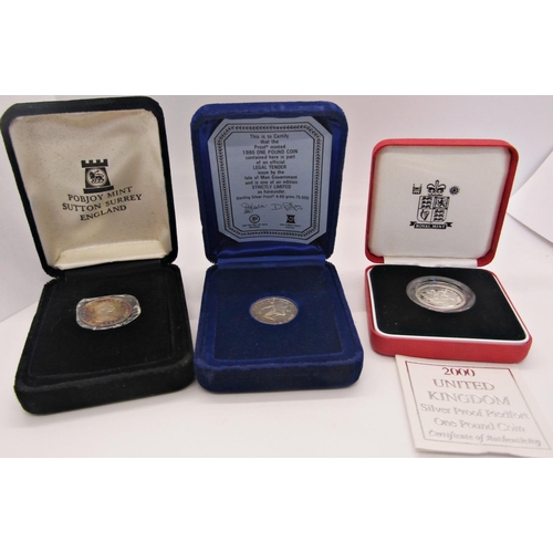 413 - Two Piedfort Silver Proof £1 coins, 2000 and 2004, Pobjoy Proof Isle of Man £1 1980 x 2 and 1991 £1 ... 