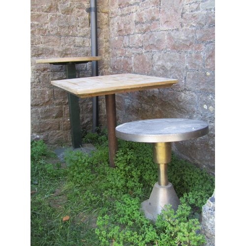 1092 - Two café or bistro tables of varying size and design, both with stripped wooden tops, together with ... 