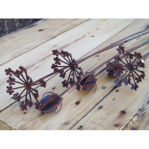 1115 - Six weathered steel ornamental garden floating border stakes comprising three teasels and three furt... 