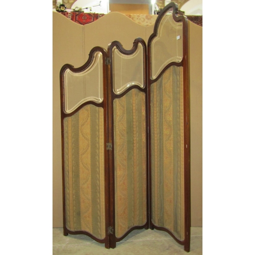 1319 - An Edwardian mahogany three fold room divider/screen with three quarter length fabric covered panels... 