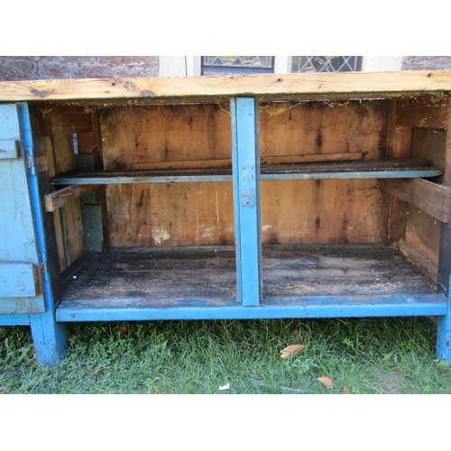 1096 - A substantial vintage partially painted pine workbench/counter of tongue and groove boarded construc... 