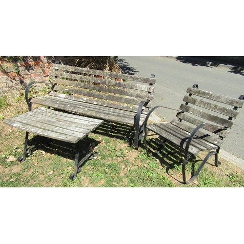 1079 - A vintage sprung steel garden bench  with weathered timber lathes, 150cm wide, together with a match... 