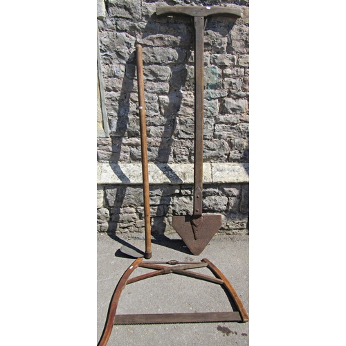 1103 - An old agricultural related? spade, with long T shaped chamfered wooden handle 169cm long together w... 