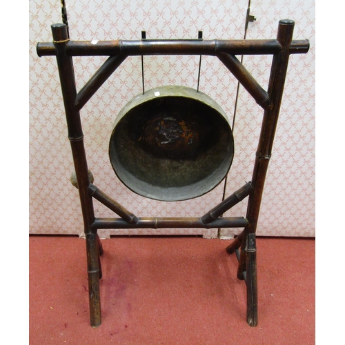 1642 - 19th century house gong and strike, set within a bamboo framework