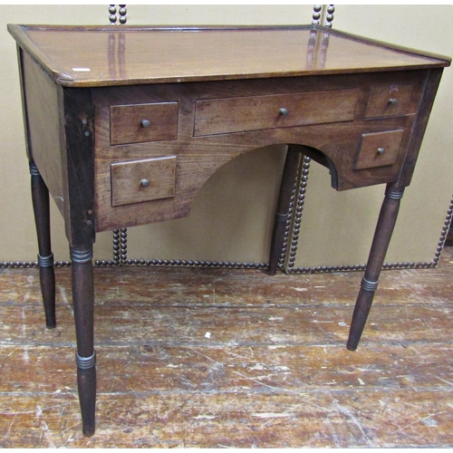 1647 - A Georgian mahogany low boy, the central kneehole surrounded by an arrangement of five drawers on fo... 