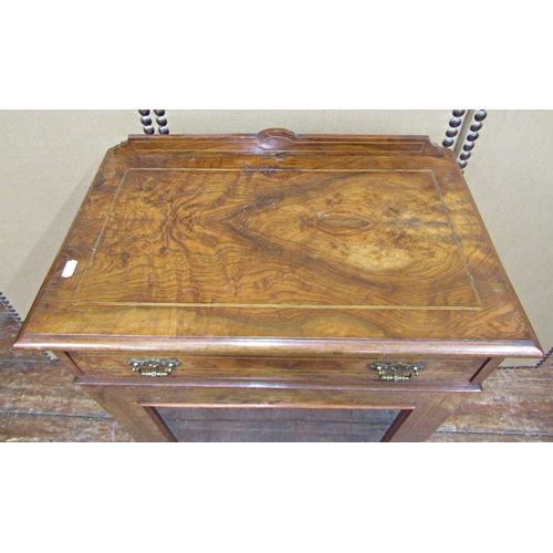 1650 - A Victorian burr walnut side cabinet - the lower section enclosed by a panelled door with single fri... 