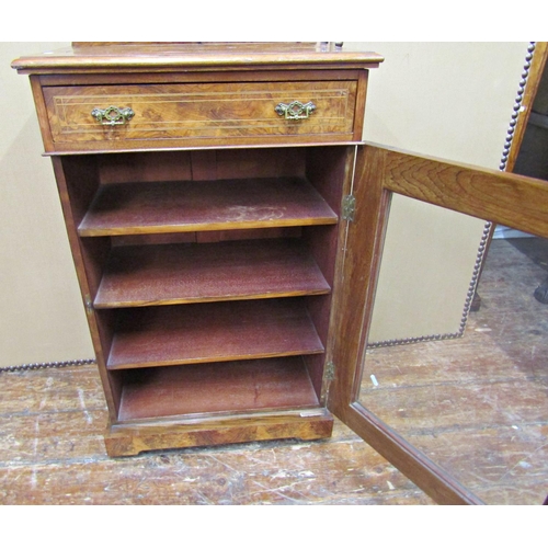 1650 - A Victorian burr walnut side cabinet - the lower section enclosed by a panelled door with single fri... 