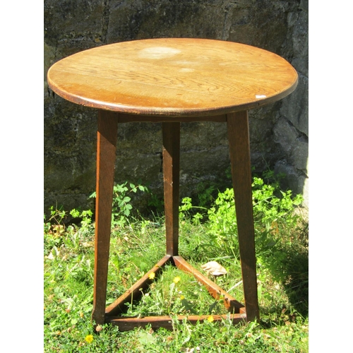 1651 - 19th century oak cricket table of usual form, with chamfered supports, 60cm diameter